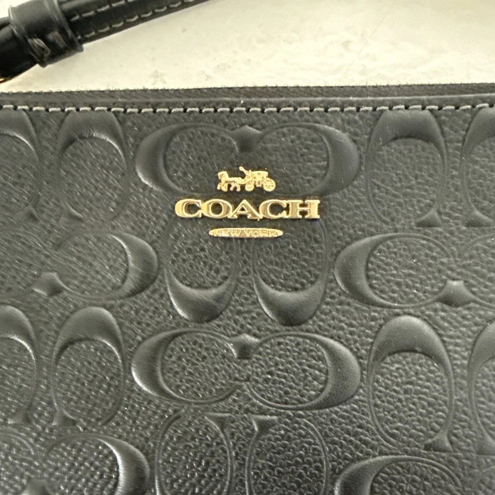 Coach Corner Zip Wristlet in Signature Leather (model F67555)